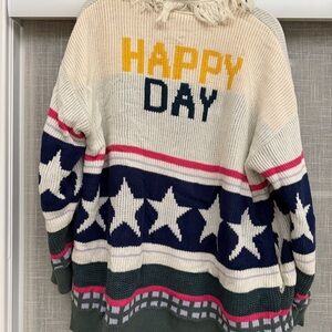 Peace Love World Cream and Pink Star Sweater